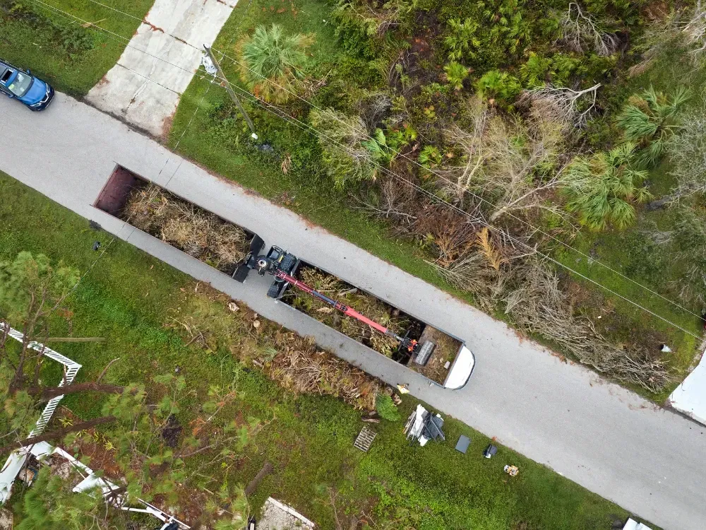 Debris removal truck land clearing haul away near Sanders Beach Coeur d'Alene
